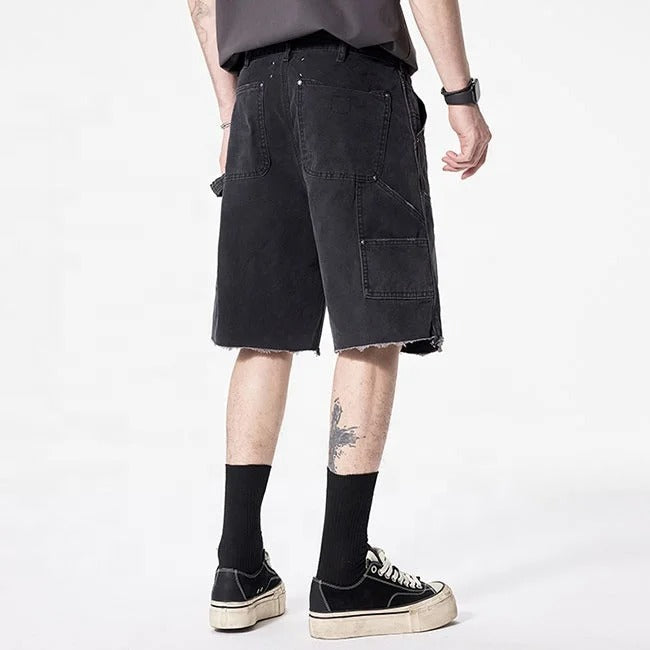 Black cargo denim shorts with utility pockets and raw hem