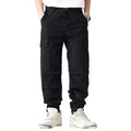 Black cargo pants with flap pockets and elastic cuffs