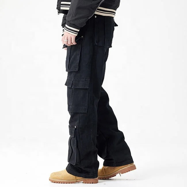 Black cargo pants with multiple flap pockets and panel detailing