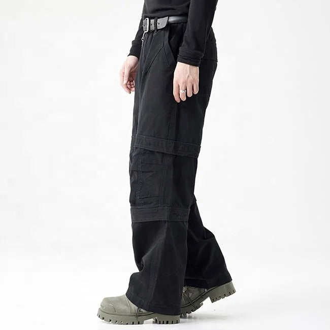 Black cargo pants with panel detailing and side chain