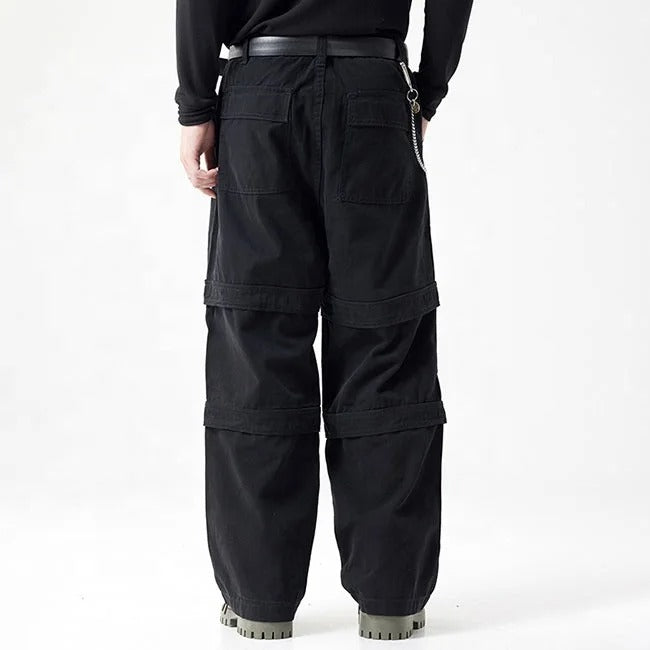 Black cargo pants with panel detailing and side chain