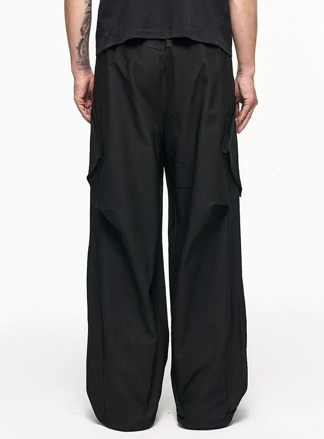 Black wide-leg cargo pants with side flap pockets