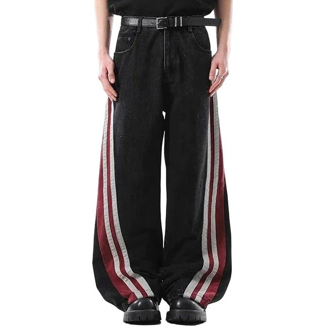Black wide-leg jeans with red and white side stripe panels