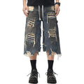 Dark blue distressed denim shorts with ripped detailing
