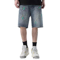 Light blue denim shorts with paint splatter detailing