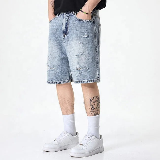 Light blue distressed denim shorts with faded wash