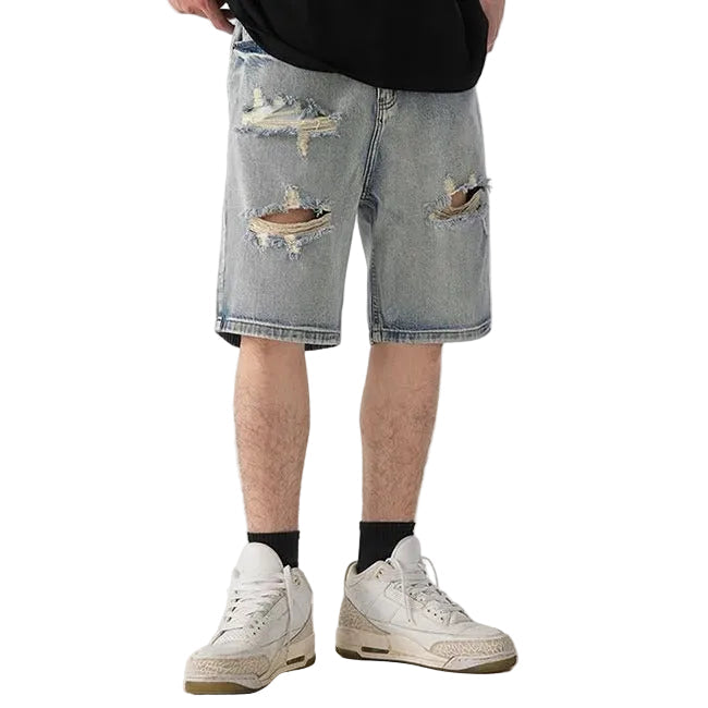 Light blue distressed denim shorts with ripped detailing